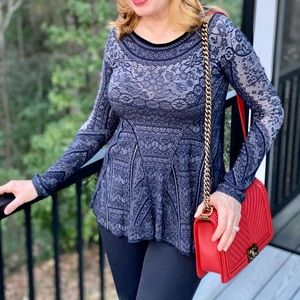 Very flattering long sleeve top in a rich navy print.
